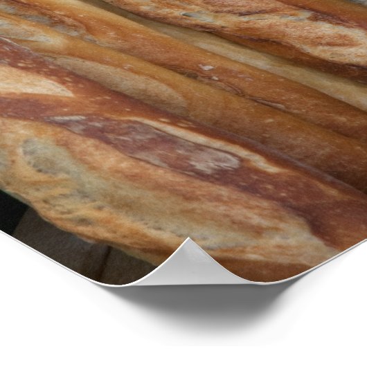 Blick auf Brotlaibe in Bäckereifenstern Poster (Ecke)