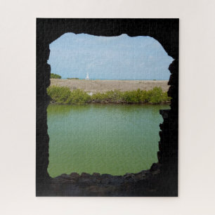 Blick auf das Wasser und die Insel durch Steinfens Puzzle