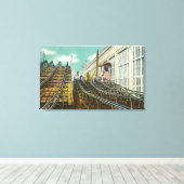 Blick auf die Achterbahnfahrt der Steeplechase Leinwanddruck (Insitu (Holzboden))