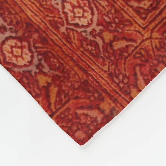 Blick des persischen Teppichs in der kupfernen Fleecedecke (Ecke)