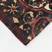 Blick des persischen Teppichs in dunkelrotem und Fleecedecke (Ecke)