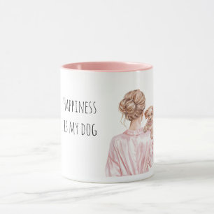 Blonde Dame hält Hund Tasse
