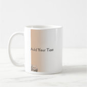 Blonde Katze mit Topaz-Augen auf Zimt-Tasse Kaffeetasse (Links)