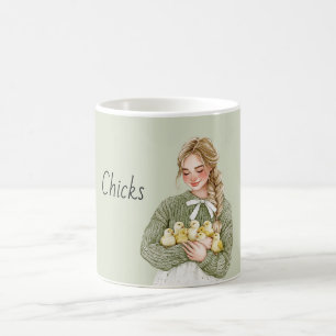 Blondes Mädchen hält Baby-Gelbe Küken Kaffeetasse
