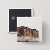 Bloße Klippe, die über Wolken steigt Button (Vorne & Hinten)