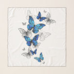 Blue Flying Butterflies Morpho Schal<br><div class="desc">Flying Blue Butterflies Morpho und weiße Schmetterlinge auf einem hellen abstrakten Hintergrund. Morpho. Design mit blauen Schmetterlingen Morpho.</div>