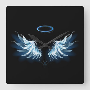 Blue Glowing Angel Wings on black background Quadratische Wanduhr
