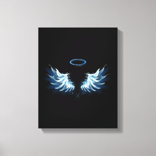 Blue Glows Angel Wings auf schwarzem Hintergrund Leinwanddruck