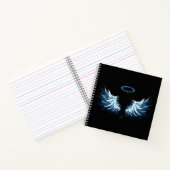 Blue Glows Angel Wings auf schwarzem Hintergrund Notizblock (Innenseite)