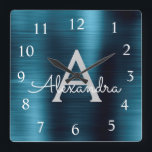 Blue Modern Elegant Metallic Monogram Name Quadratische Wanduhr<br><div class="desc">Moderne und elegante blaue Imitat Edelstahlfolienmonogramm-Name und Personalisierte Vorlagenklemme. Die Wall Clock ist das ideale Geschenk für jemanden,  der eine schicke,  schicke Metalldekoration Liebe,  um Weihnachten oder Geburtstag zu schenken.</div>
