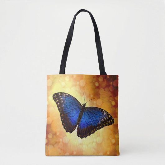 Blue Morpho Butterfly auf Bokeh Gold Tasche (Vorderseite)