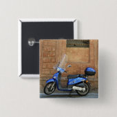 Blue Motor Scooter by red wall, Siena, Italien Button (Vorne & Hinten)