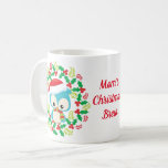 Blue Owl Santa Hat Christmas Wreath Kaffeetasse<br><div class="desc">This cute,  Christmas image features a blue owl,  dressed in a Santa hat,  and scarf,  sitting in a wreath of holly,  and berries.
Image ©Prettygrafik.com</div>