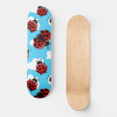 Blue Sky White Clouds Red Ladybug Käfer Skateboard (Vorderseite)