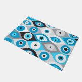 Blues des griechischen Bösen Auges und des Graues Fußmatte (Schrägansicht)