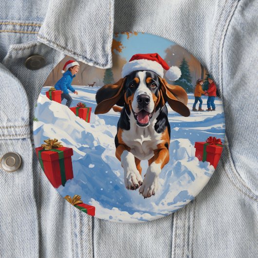 Bluetick Coonhound läuft im Schnee mit Weihnachten Button (Beispiel)