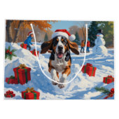 Bluetick Coonhound läuft im Schnee mit Weihnachten Große Geschenktüte (Rückseite)
