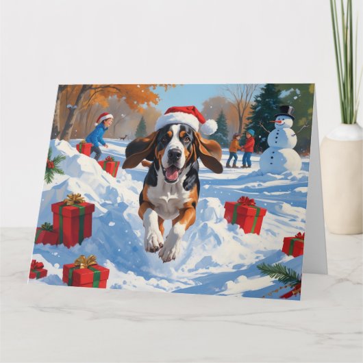 Bluetick Coonhound läuft im Schnee mit Weihnachten Karte (Vorderseite)
