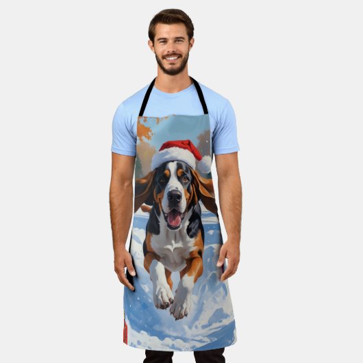 Bluetick Coonhound läuft im Schnee mit Weihnachten Schürze (Getragen)