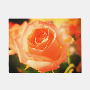 Blühende orangefarbene Rose Fußmatte