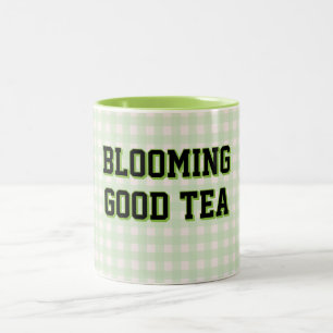 BLÜHENDER GUTER TEE Grünes Gingham-Hintergrund Zweifarbige Tasse