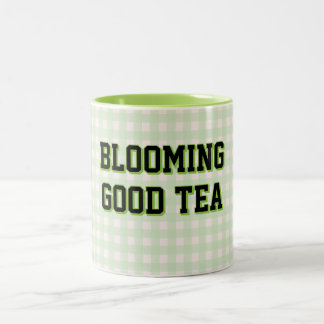 BLÜHENDER GUTER TEE Grünes Gingham-Hintergrund Zweifarbige Tasse
