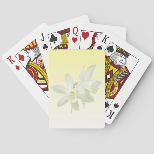 Blume auf gelben Spielkarten (Rückseite)