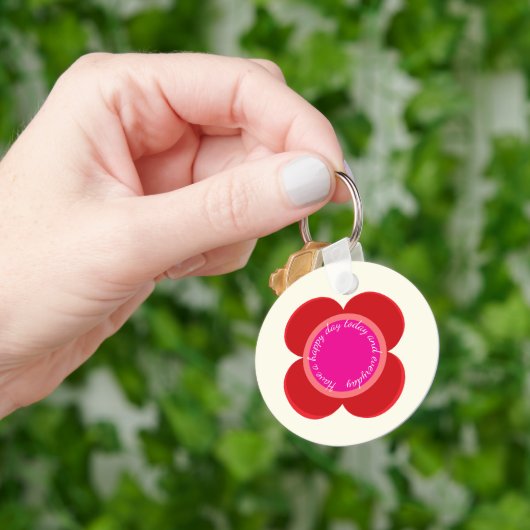 Blume auf schlüsselanhänger (Hand)