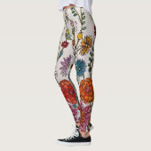 Blume auf weißen Leggings (Links)