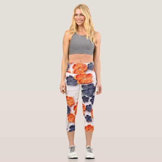 Blume aus handgefertigten Frühlingstoffen, orange Capri Leggings (Vorderseite)