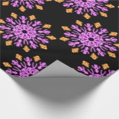 Blume aus rosa und orangefarbenem Neon Geschenkpapier (Ecke)