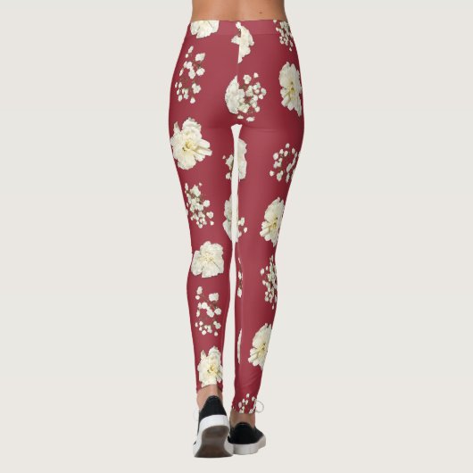 Blume der weißen Nelken auf Gemustertem Rot Leggings (Rückseite)