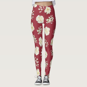 Blume der weißen Nelken auf Gemustertem Rot Leggings