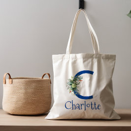 Blume mit elegantem Buchstaben, blau Tragetasche