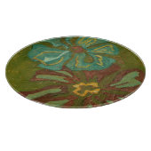 Blume von Aqua und Burnt Orange im grünen Hintergr Schneidebrett (Ecke)