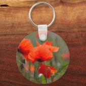 Blume von Mohn in einem Feld. Schlüsselanhänger (Vorderseite)