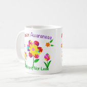Blume zur Sensibilisierung für Autismus Kaffeetasse (Vorderseite Links)