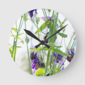 Blumen in der Natur. Runde Wanduhr (Vorderseite)