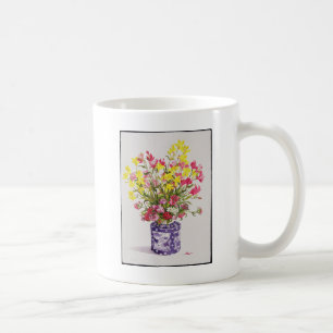 Blumen in einem chinesischen Glas Kaffeetasse