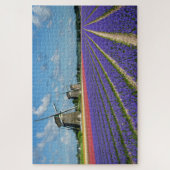 Blumen und Windmühlen in einer Frühlingslandschaft Puzzle (Vertikal)