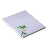 Blumendesign auf blau notizblock (angewinkelt)