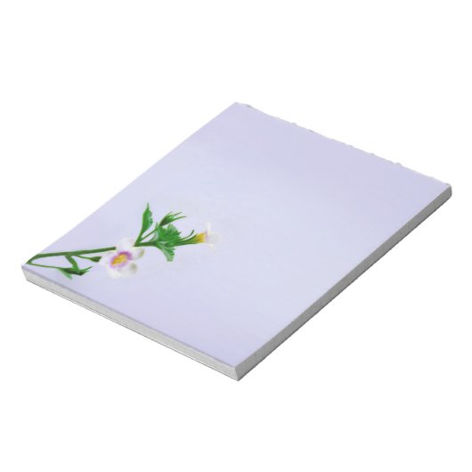 Blumendesign auf blau notizblock (Rotiert)