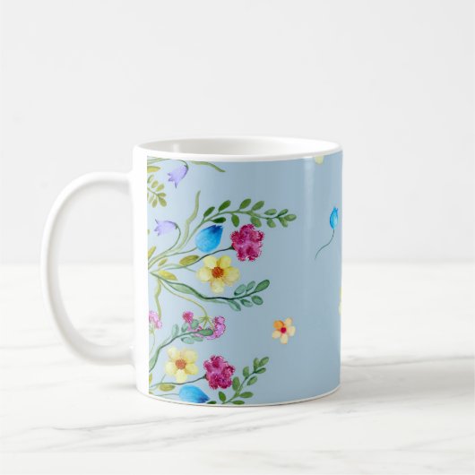 Blumenfarbmuster in blauen Tönen Kaffeetasse (Links)