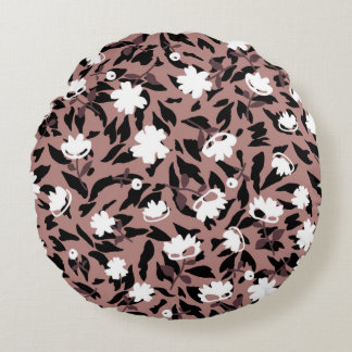Blumenmuster auf Leopardenhintergrund. Rundes Kissen
