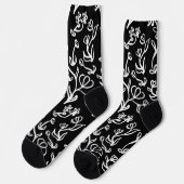 Blumenmuster in Weiß auf Schwarz Socken (Linkes Detail)
