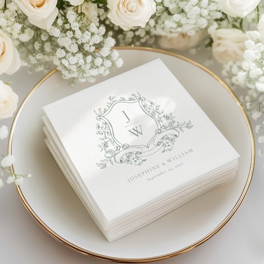 Blumenmuster-Wappen-Hochzeitsgeschenk auf grüner E Serviette