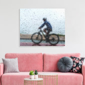 Blurred Cyclist Through Rainy Window Leinwanddruck (Insitu (Wohnzimmer))