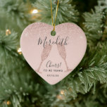 Blush Rose Gold 40th Birthday Heart Date of Birth Keramik Ornament<br><div class="desc">Our Unique 40th Birthday ceramic ornament holiday gift feature a feminine blush pink glitter background with rose gold champagne glasses ready to toast the birthday honee, whose name is written on the heart-shaped ornament in elegant script typography. Additional example text reads: "Cheers! To 40 Years" followed by the date of...</div>