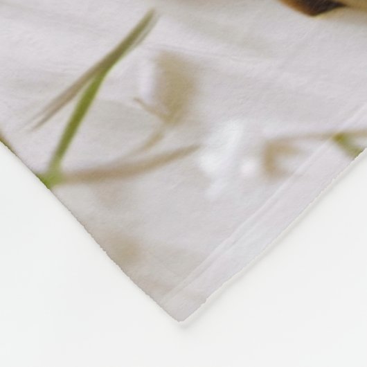 Blütenbaum aus einem Buch Fleecedecke (Ecke)