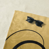 Blütenwirbel aus Gold und Schwarz Strandtuch (Beispiel)